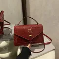 Deep red crocodile embossed crossbody bag with golden hardware and top handle for women - Crocodile / Red