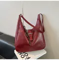 Detail of dark red vintage hobo bag with textured leather and silver metallic buckle - With Pendant / Burgundy