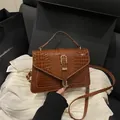 Brown crocodile pattern crossbody handbag with golden horseshoe buckle detail - Brown Without Pendant