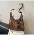 Vintage dark brown leather shoulder bag with silver hardware and braided strap detail - With Pendant / Brown