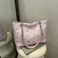 Pink floral bow shoulder bag with quilted texture and silver chain strap - No Pendant / Pink