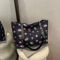 Black tote bag featuring pink rose patterns and chain strap in a stylish square shape - No Pendant / Black