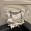 Cream quilted tote bag with pink rose bow print and silver chain strap details - With Pendant / White