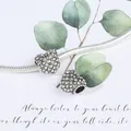 Elegante roségouden hartbedel met pavé kristallen op een zilveren slangenketting - Zilver