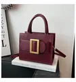 Structured burgundy square handbag with signature large gold buckle and handle - Red