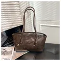 Retro dark brown large capacity tote bag with knot strap details and embossed text - Coffee