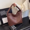 Große dunkelbraune geflochtene Tragetasche aus Leder im Intrecciato-Stil für Damen - Kaffeebraun