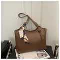 Brown faux leather tote bag with stylish blue silk scarf and white contrast stitching - Brown