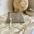 Elegante borsa jacquard grigia stile Cheongsam con manico dorato e nappina - Verde