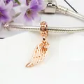 Rose gold hollow angel wing charm on a silver snake chain bracelet with barrel clasp - Gold