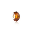 Close-up of faceted amber glass charm bead with silver metal core for DIY bracelets - Amber