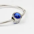 Blue opal faceted charm with heart hollow design on silver snake chain bracelet - Dark Blue