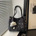 Floral butterfly print black tote bag with quilted texture and soft cloud charm - With Pendant / Black