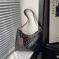 Retro gesteppte Tragetasche in Schwarz mit brauner Lederschleife und Schultergurt - Schwarz