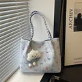 Quilted floral tote bag in light blue with butterfly prints and cloud charm accessory - With Pendant / Blue
