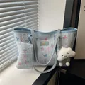 Light blue floral tote bag set with textured finish and cloud plush pendant accessory - With Pendant / Blue