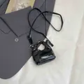 Mini black glossy patent leather handbag with Fashion lettering and silver shoulder strap - Letter Print Style / Black