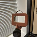 Trousse de maquillage marron avec fenêtre transparente et cuir synthétique texturé - Marron