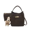 Dunkelbraune Wildleder-Eimertasche im Set mit Metalldrehverschluss und Plüsch-Anhänger - Stil Mit Reißverschluss Innentasche / Kaffee Mit Anhängern