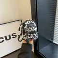 Mini leopard print crossbody bag for girls with adjustable woven shoulder strap - Leopard Print