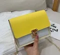 Contrast color small square crossbody bag with gold lock and chain strap in yellow and blue - White and Yellow