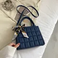 Navy blue quilted square handbag with silk scarf decor on handle and strap - Blue