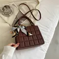 Dark brown plaid embossed handbag with elegant silk scarf wrap and adjustable strap - Brown