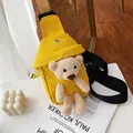 Bright yellow canvas crossbody bag with a cute brown teddy bear plush for women - Yellow