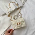 Mini off-white quilted crossbody bag with luxury pearl handle and gold chain strap - White