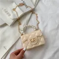 Mini cream quilted jelly bag with pearl handle and golden chain strap in stylish look - Apricot