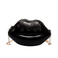 Glossy black lip-shaped crossbody bag with gold chain strap for fashionable women - Black