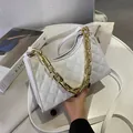 Quilted white crossbody bag with gold chain strap and elegant rhombic pattern finish - White