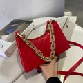 Elegant red faux leather shoulder bag with quilted diamond pattern and gold chain - Red