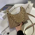 Khaki quilted crossbody bag with chunky gold chain handle and slim shoulder strap - Khaki