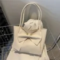 Bolso tote blanco crema de piel sintética con un lazo grande y asas delgadas - Blanco