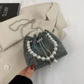 Chic rhinestone bucket bag with large pearl handle and iridescent crystal finish - Colorful