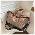 Borsa da viaggio pied-de-poule con manici in pelle marrone e tracolla nera - Marrone