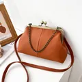 Caramel lychee grain shell bag with vintage bronze clasp and chain strap accessory - Tan