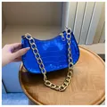 Glossy electric blue hobo bag with crocodile embossed texture and chunky gold chain - Blue