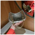 Silver metallic moon bag with crocodile texture and chunky gold chain handle for women - Silver