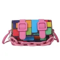 Detailed close-up of mini pixel crossbody bag with colorful patterns and pink chain - Pink