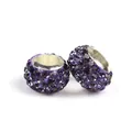 Detailed close-up of purple pavé crystal charm beads with silver metal core for DIY bracelets - Purple