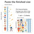 Cartoon astronaut and planets height chart wall sticker for kids room decor - 30x60cm