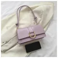 Light purple leather underarm bag with gold horseshoe buckle and size reference - Purple