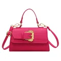Hot pink crocodile pattern crossbody bag with ornate gold buckle and top handle - Rose Red