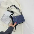 Navy blue mini suitcase crossbody bag with Forever Young branding and hard shell texture - Dark Blue