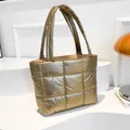 Quilted padded tote bag in metallic gold finish with square stitching for women - Gold