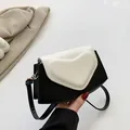 Modische schwarz-weiße Umhängetasche mit Herz-Design im minimalistischen Stil - Schwarz