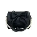 Elegant black bow shoulder bag with luxury pearl handle and matte leather finish - Black