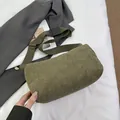 Olive green corduroy cylindrical crossbody bag with wide canvas strap for daily commute - Green
